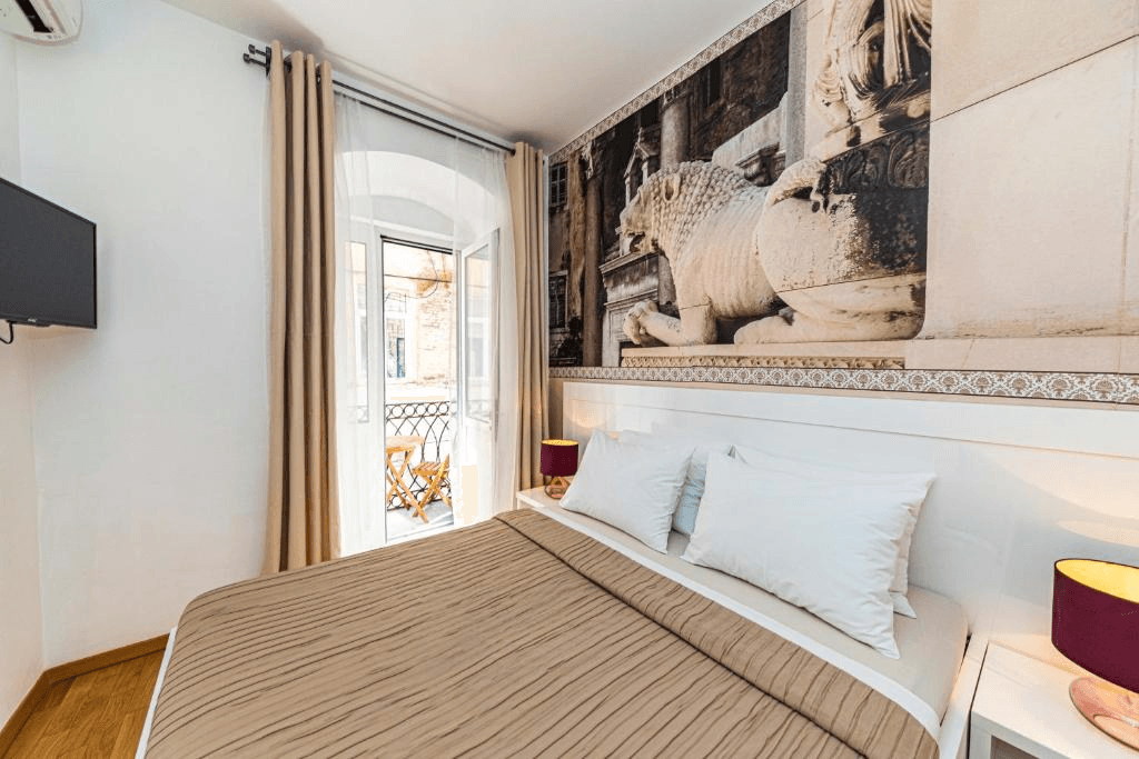 Riva City Rooms — sea-facing window